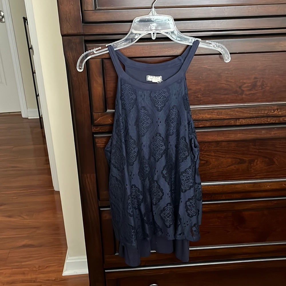 Navy sleeveless flutter top